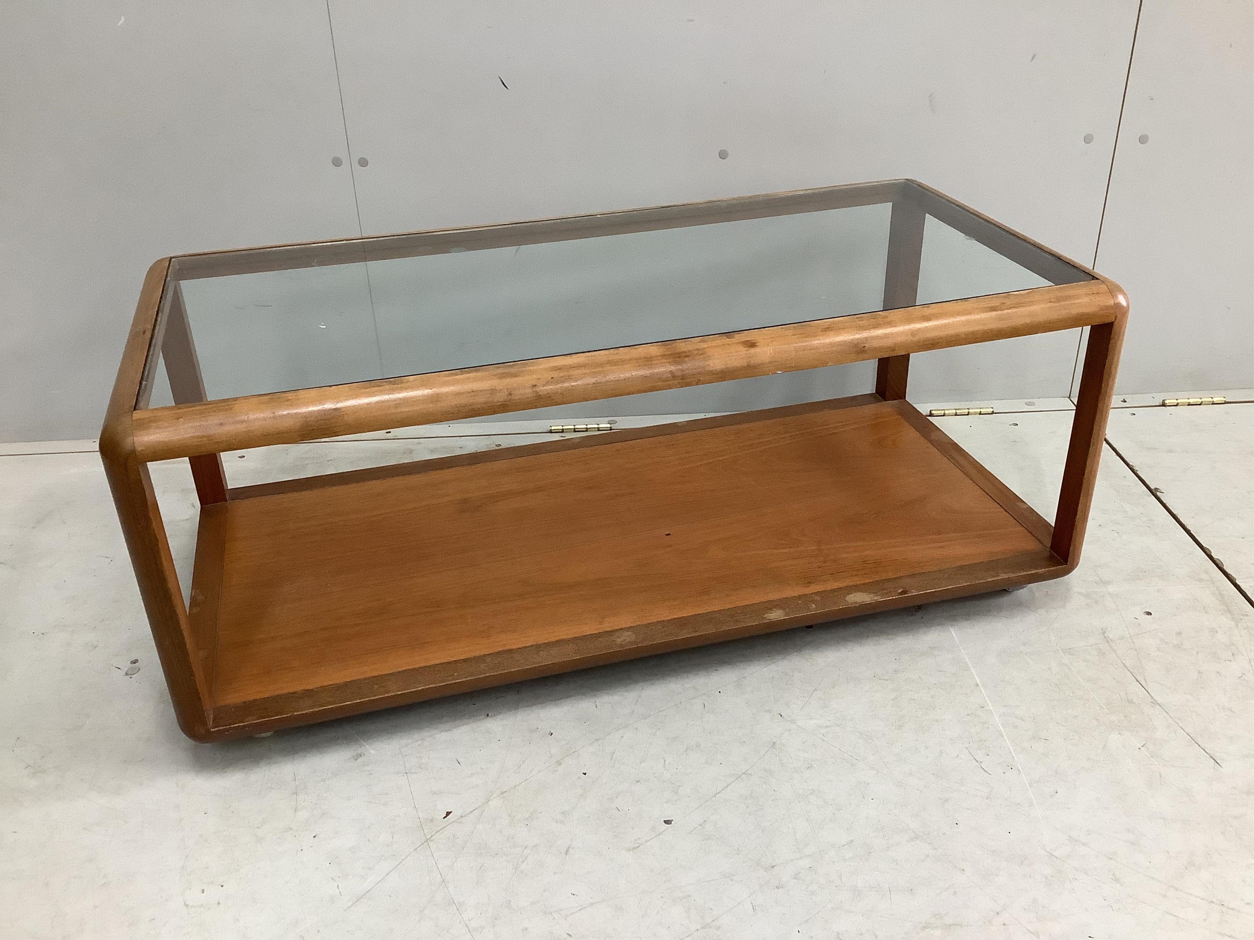 A mid century rectangular G plan glass top coffee table, width 110cm, depth 54cm, height 45cm. Condition - fair